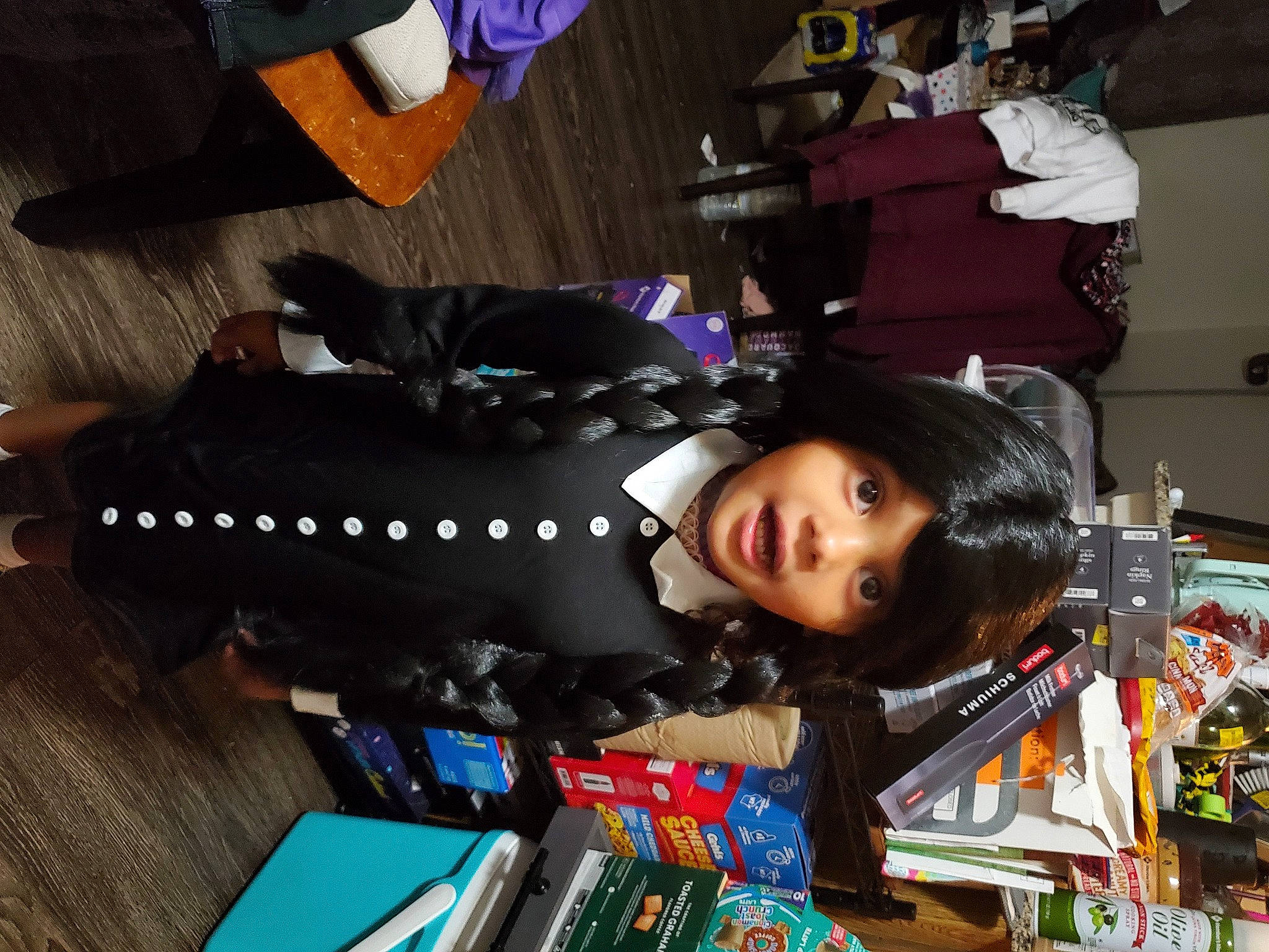 Harmony is registered to the contest to win money with this photo: beauty, black_hair, book, child, collection, flooring, fun, person, publication, retail, room, snapshot, surprise, toddler