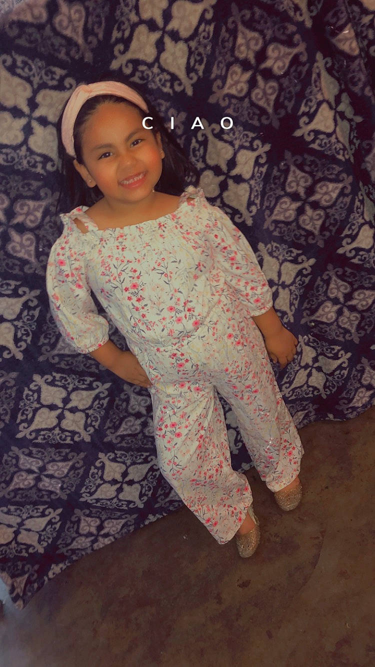 Naveah joined the competition — help win amazing prizes! barefoot, black_hair, child, face, flash_photography, floor, flooring, fun, happy, head, headwear, human_leg, joy, pattern, person, room, sitting, skin, sleeve, smile