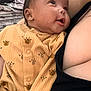 Ocean joined the competition — help win amazing prizes! baby, infant, onesie, yellow_clothing, cute, face, happy, looking_up, person, skin, closeup, child, newborn, patterned_clothing, expression, holding, indoor, fabric, comfort, soft
