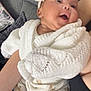 Ocean joined the competition — help win amazing prizes! baby, smiling, headband, bow, knitted_sweater, couch, cushion, infant, person, happy, indoors, soft_fabric, pink_socks, legs, arm, closeup, child, cute, portrait, cozy