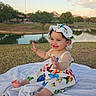 Ariel joined the competition — help win amazing prizes! baby, barefoot, blanket, butterflies, child, dress, grass, hat, laughing, mountains, outdoor, park, pond, portrait, sitting, smiling, sunset, toddler, trees, water