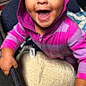 baby, child, smiling, hoodie, purple, playpen, toy, blanket, happy, infant, cute, indoors, person, clothing, face, hands, expression, joy, young, wearing