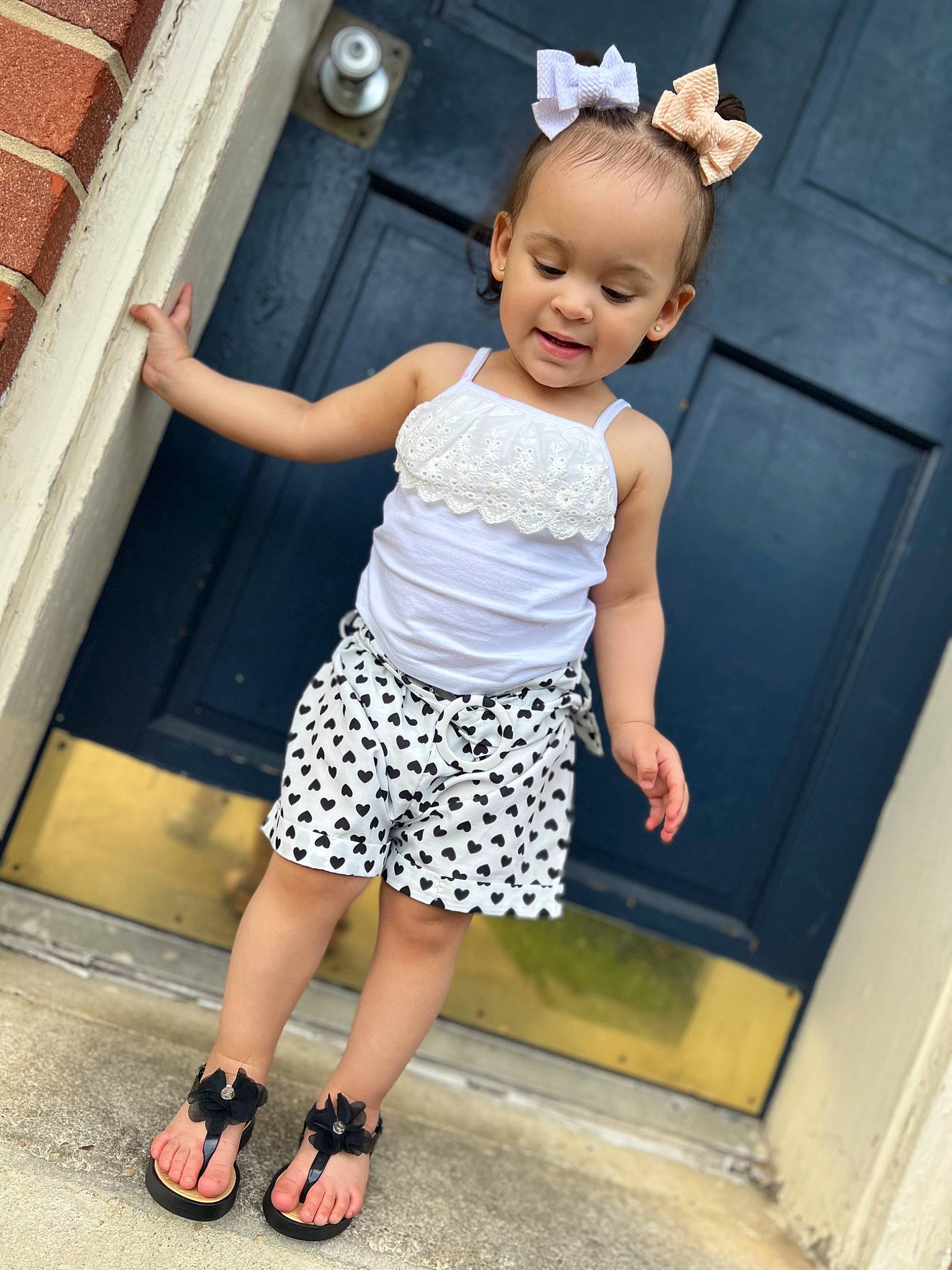 Zaniyah is registered to the contest to win money with this photo: azure, baby_toddler_clothing, day_dress, hairstyle, happy, joint, knee, leg, neck, person, pink, shoe, shoulder, sleeve, standing, street_fashion, style, textile, thigh, waist