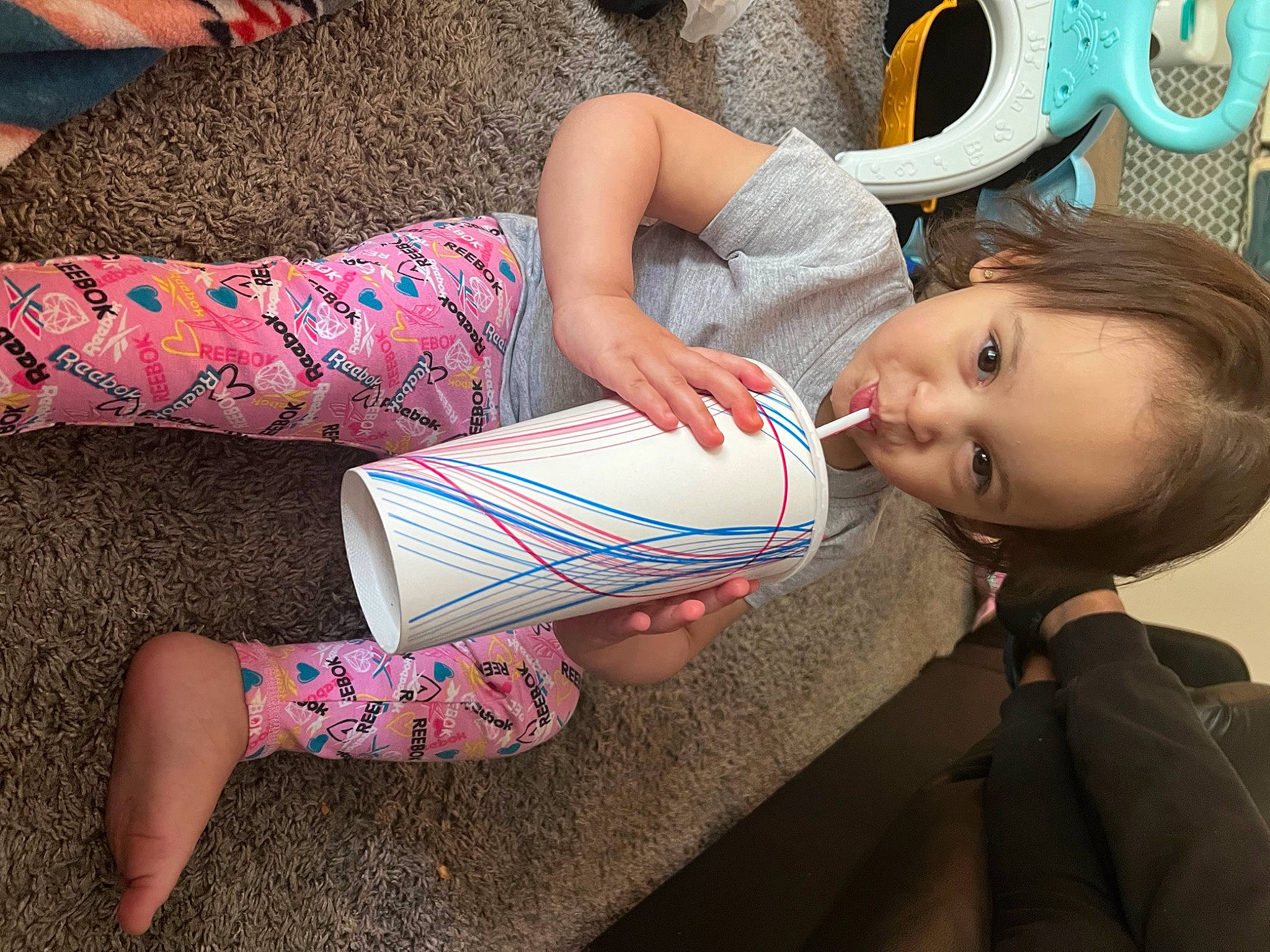 Zaniyah joined the competition — help win amazing prizes! baby_toddler_clothing, barefoot, child, comfort, finger, foot, happy, human_leg, joint, knee, lap, leg, mechanical_fan, nail, pattern, person, play, sitting, textile, thigh