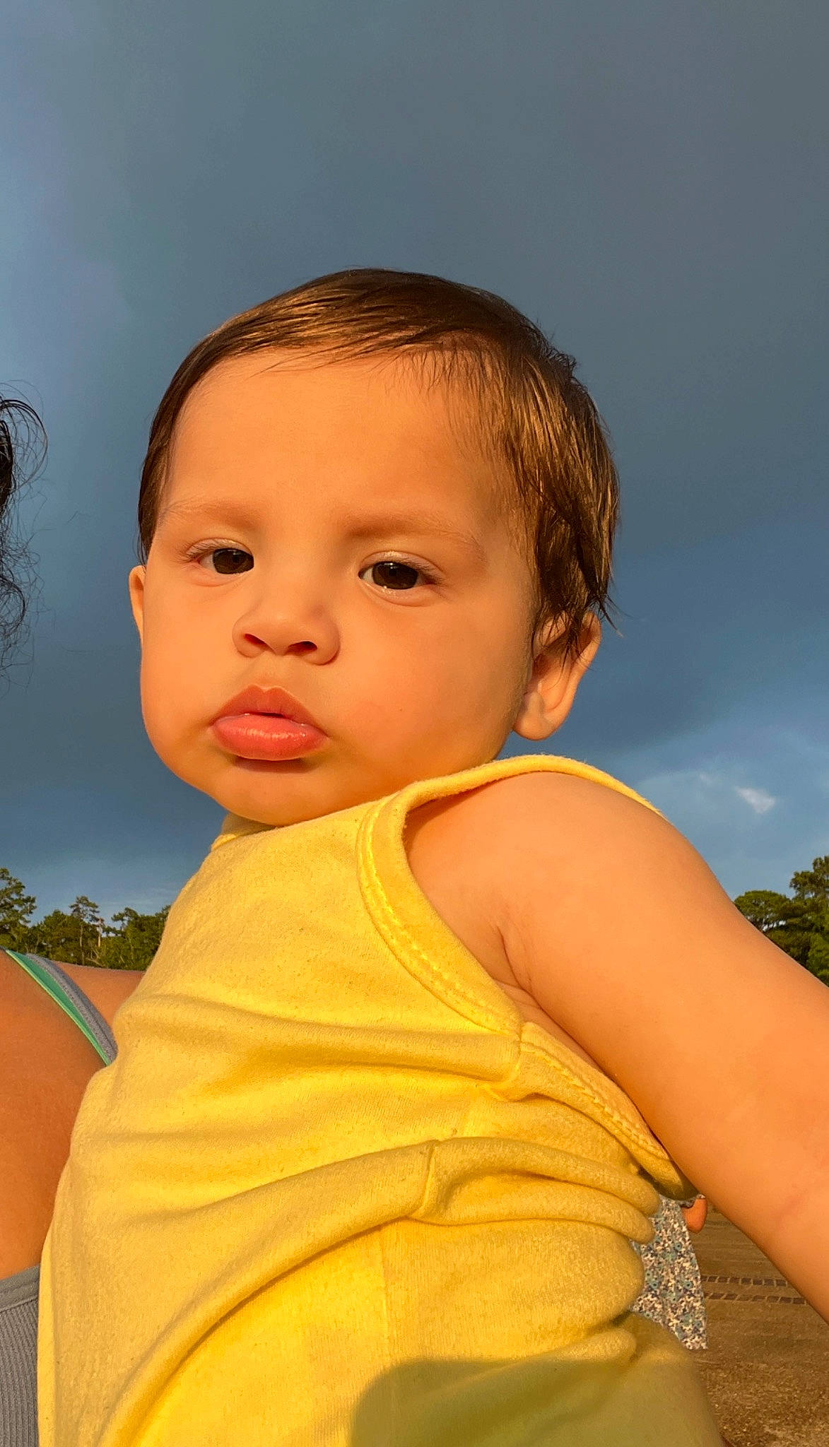 Andres is registered to the contest to win money with this photo: baby, baby_toddler_clothing, cheek, chin, cloud, eyelash, flash_photography, grass, happy, human_body, iris, leisure, lip, neck, nose, person, skin, sky, sunlight, toddler