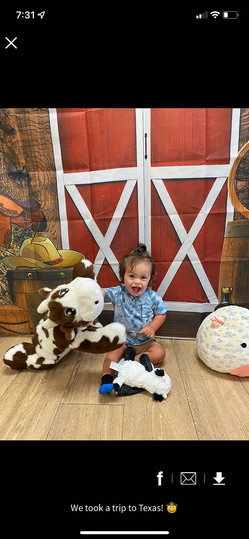 Kaiser is registered to the contest to win money with this photo: baby, ball, child, companion_dog, flooring, football, fun, fur, happy, leisure, person, play, sitting, smile, sporting_group, stuffed_toy, t_shirt, toddler, toy, white