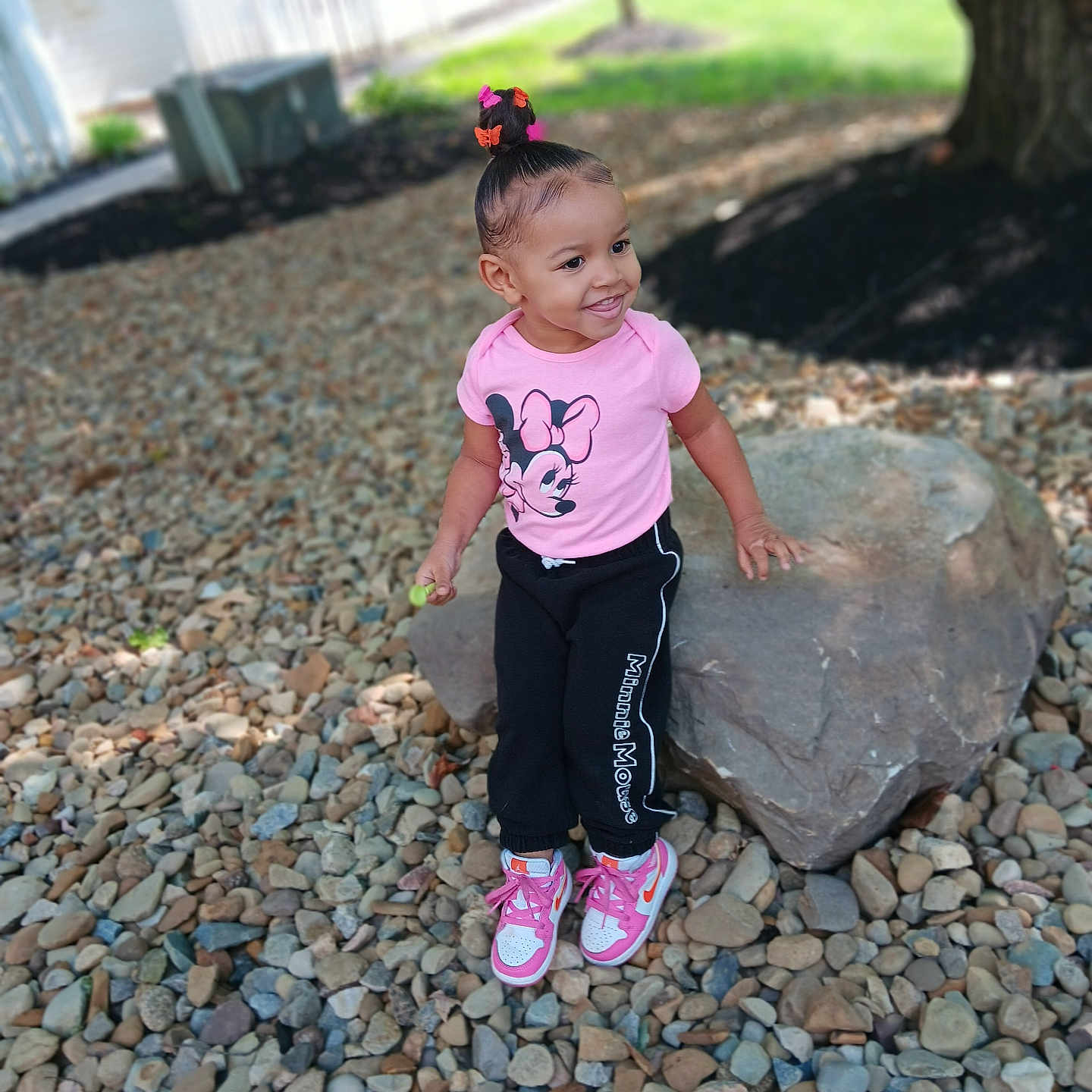 Journi is registered to the contest to win money with this photo: child, clothing, face, female, footwear, grass, head, pants, path, pebble, person, photography, plant, portrait, road, rock, shoe, slate, soil, walkway