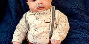 Beau joined the competition — help win amazing prizes! baby, blanket, blue_background, cap, child, clothing, cute, expression, eyebrows, face, funny_costume, hat, indoors, infant, mustache, pants, person, portrait, shirt, suspenders