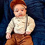 Beau joined the competition — help win amazing prizes! baby, child, face, clothing, hat, cap, mustache, eyebrows, suspenders, pants, shirt, blanket, blue_background, cute, portrait, indoors, infant, funny_costume, expression, person