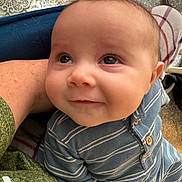 Beau joined the competition — help win amazing prizes! baby, infant, child, smile, face, eyes, clothing, striped, onesie, person, arm, blanket, texture, soft, indoor, portrait, cute, happy, young, cozy