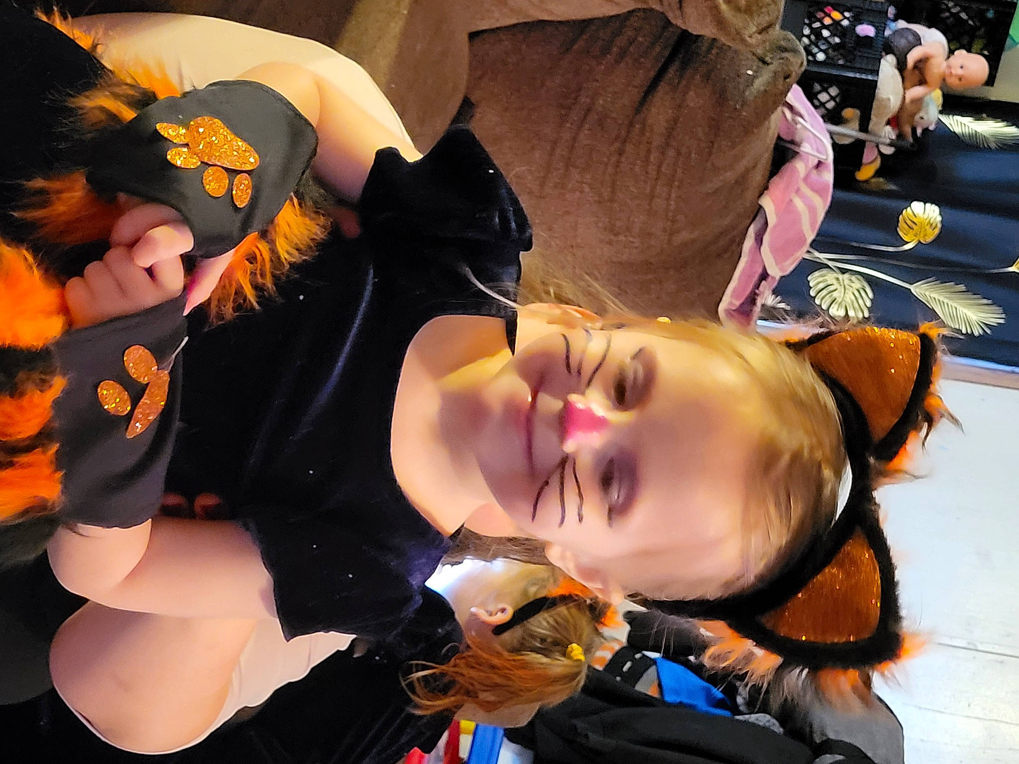 Amelia is registered to the contest to win money with this photo: animated_cartoon, animation, anime, art, black_hair, child, costume, event, eyelash, eyewear, fashion_design, fiction, fictional_character, fun, human_leg, joy, mouth, orange, person, thigh