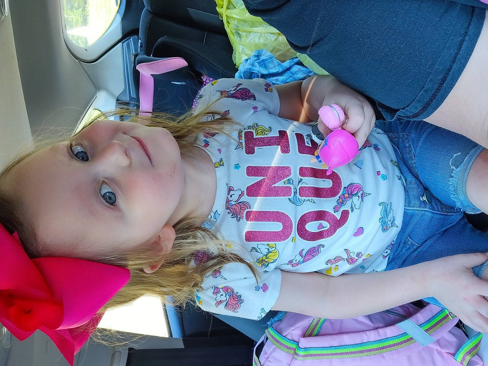 Liliana is registered to the contest to win money with this photo: baby, baby_products, baby_toddler_clothing, car_seat, cheek, child, clothing, comfort, eyelash, fun, happy, magenta, mouth, nose, pattern, person, pink, skin, sleeve, textile