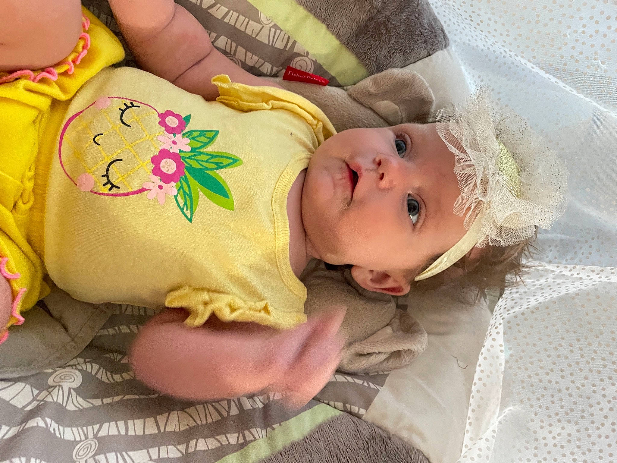 Jupiter is registered to the contest to win money with this photo: baby, baby_toddler_clothing, doll, elbow, eye, eyelash, finger, hand, happy, head, headgear, headwear, human_leg, joint, linens, lip, person, rose, skin, temporary_tattoo