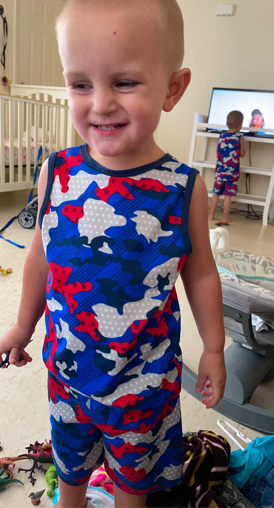 Josiah joined the competition — help win amazing prizes! blue, blurred, chair, child, electric_blue, event, fashion_design, fun, hairstyle, happy, joy, pattern, people, person, sleeve, smile, standing, street_fashion, t_shirt, tableware