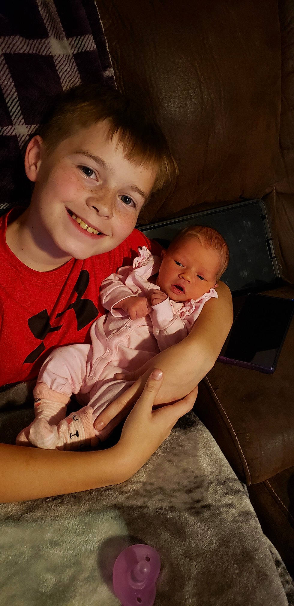 Skylar joined the competition — help win amazing prizes! arm, baby, cheek, eye, face, facial_expression, finger, flash_photography, gesture, hairstyle, happy, head, human_body, interaction, joy, lap, leg, mouth, person, skin