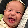 Isadora joined the competition — help win amazing prizes! baby, smile, face, headband, bow, teeth, closeup, infant, expression, joy, cute, apparel, skin, person, happy, cheek, mouth, tongue, clothing, child