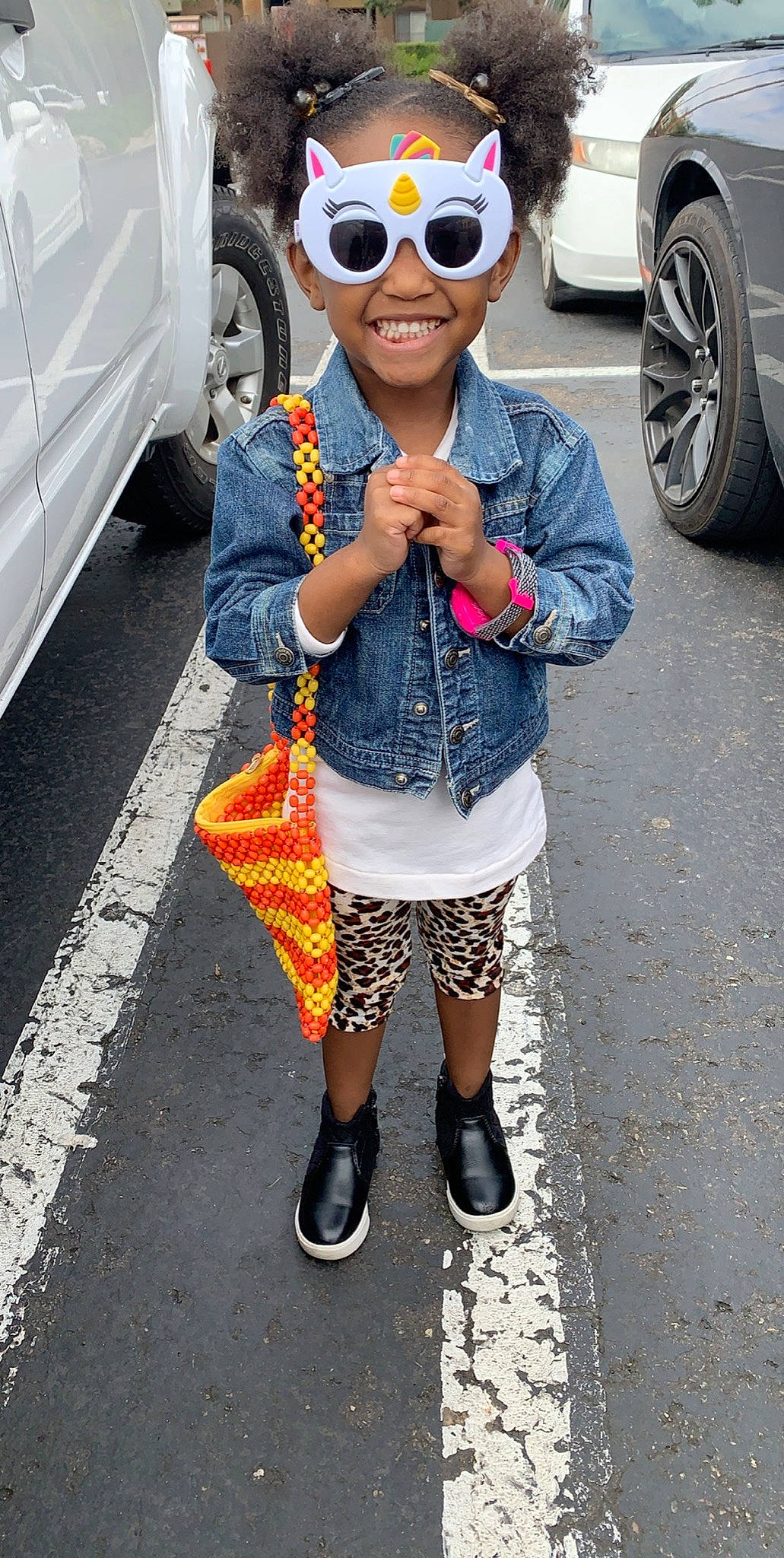 Ariah is registered to the contest to win money with this photo: asphalt, automotive_design, automotive_lighting, automotive_tire, car, eyewear, fashion, footwear, glasses, goggles, joy, person, shoe, street_fashion, style, sunglasses, tire, vehicle, vision_care, wheel