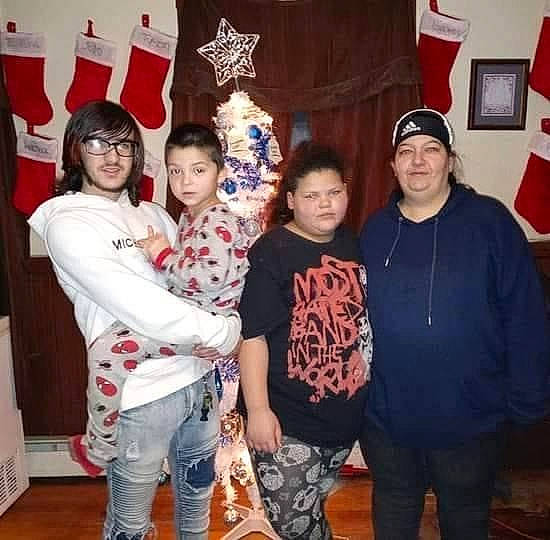 Alfred is registered to the contest to win money with this photo: cap, cool, denim, eye, flag, headwear, holiday, person, picture_frame, social_group, temple