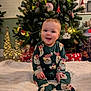 Seren is registered to the contest to win money with this photo: baby, child, christmas_tree, pajamas, smiling, holiday, decorations, lights, presents, festive, indoors, blanket, sitting, cute, face, happy, christmas, seasonal, cozy, celebration