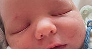 Wyatt is registered to the contest to win money with this photo: baby, blanket, child, closeup, cozy, cute, face, hand, human, indoors, infant, newborn, pacifier, peaceful, portrait, resting, skin, sleeping, soft, wrapped
