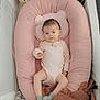 Jupiter joined the competition — help win amazing prizes! baby, infant, crib, pink_cushion, blanket, plush_toy, socks, clothing, soft_toys, sleeping_area, baby_bed, comfort, indoor, resting, cute, child, newborn, face, person, cozy