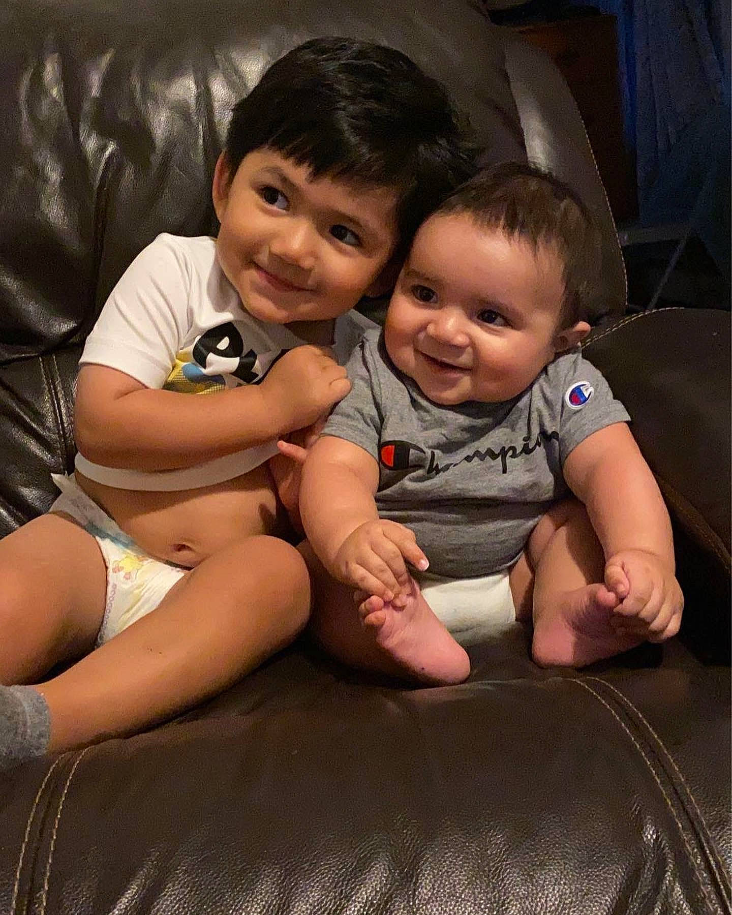 Joziah joined the competition — help win amazing prizes! arm, cheek, child, fun, hand, joy, leg, person, sibling, sitting, skin, smile, toddler