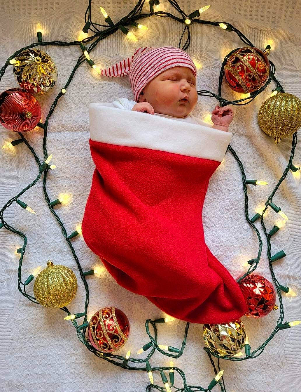 Elliana is registered to the contest to win money with this photo: art, baby, cap, christmas_decoration, costume_hat, event, fashion_accessory, floral_design, fur, hat, headgear, headwear, interior_design, jewellery, linens, ornament, pattern, peach, person, petal