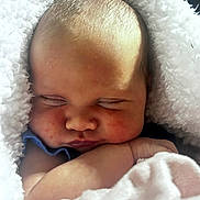 Abigayle is registered to the contest to win money with this photo: adorable, baby, blanket, child, close_up, cozy, cute, face, fluffy, infant, newborn, peaceful, portrait, relaxed, rosy_cheeks, skin, sleeping, soft, toddler, wrapped