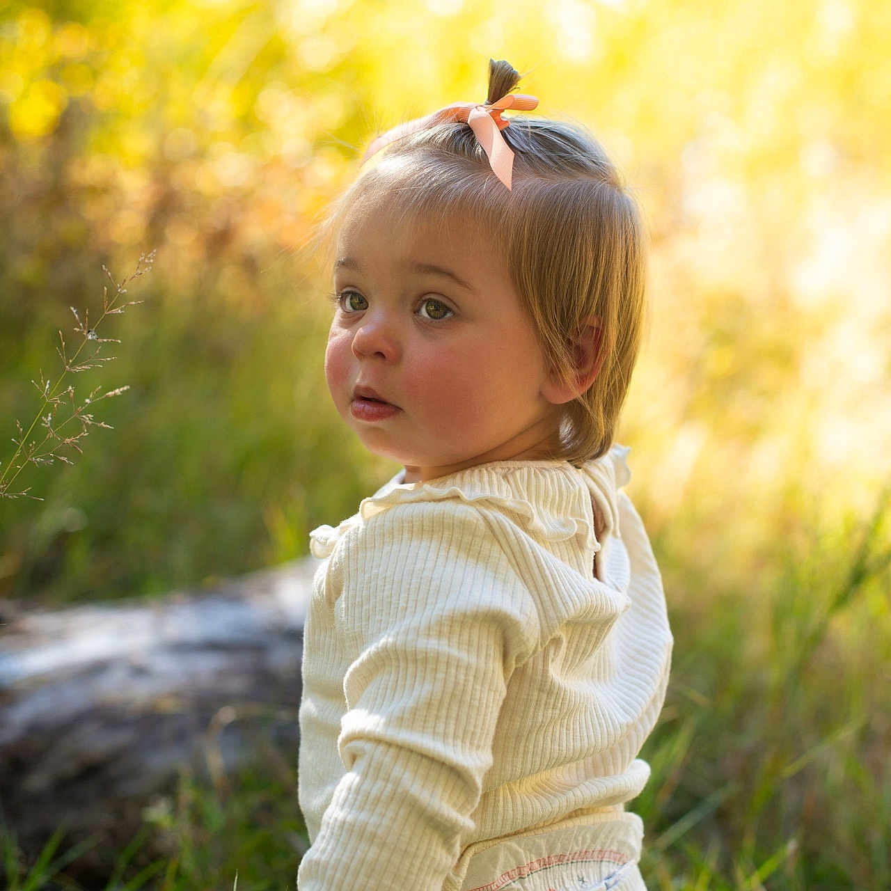 Sadie joined the competition — help win amazing prizes! bodypart, child, clothing, face, female, finger, girl, grass, hand, happy, head, knitwear, longsleeve, person, photography, plant, portrait, sitting, sleeve, sweater
