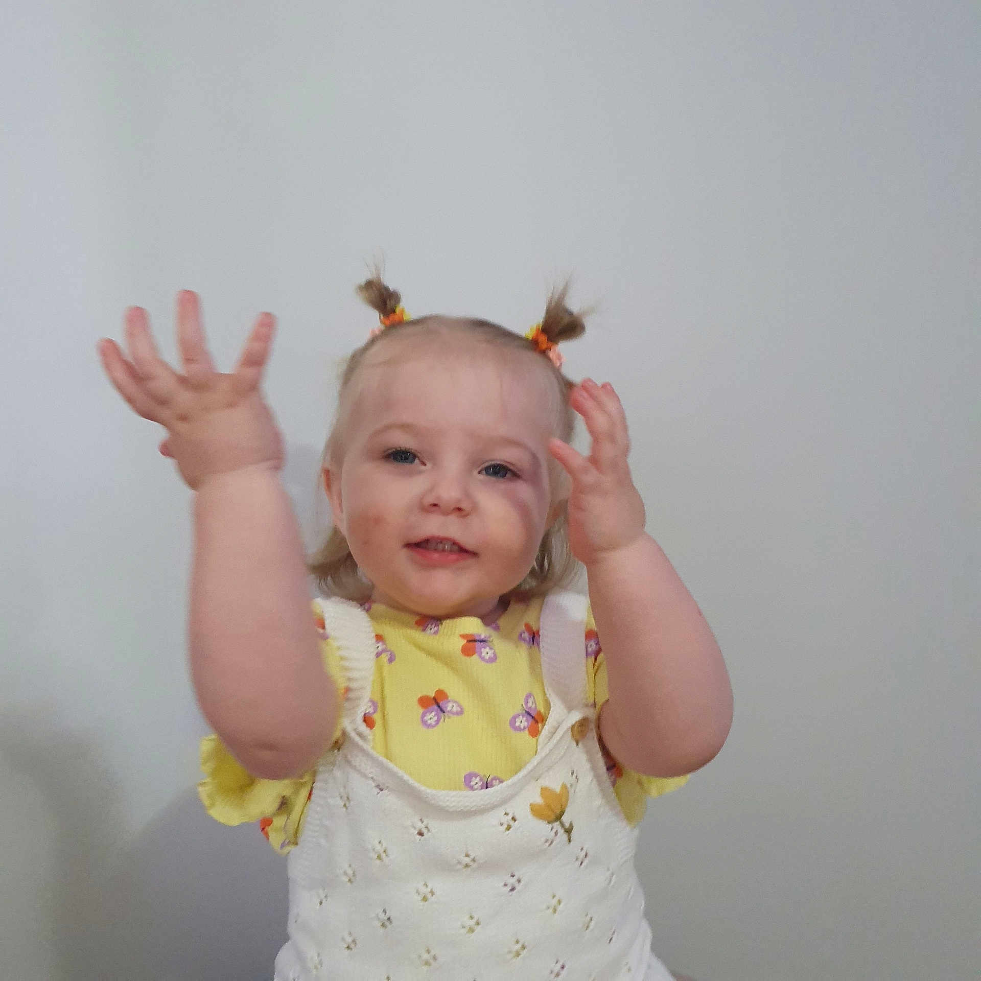 Saylor joined the competition — help win amazing prizes! accessories, baby, bodypart, clothing, dress, face, finger, hand, happy, head, jewelry, laughing, mouth, necklace, person, photography, portrait, smile, t_shirt, wrist