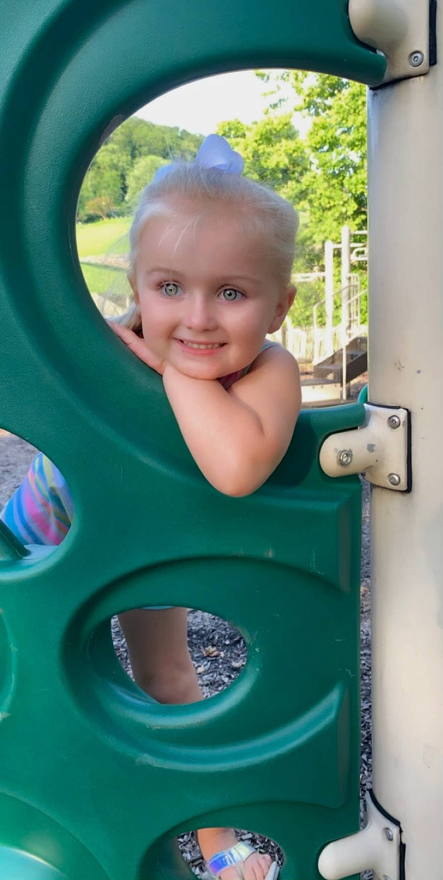 Baylee joined the competition — help win amazing prizes! automotive_tire, baby, baby_toddler_clothing, child, chute, city, electric_blue, eye, fun, grass, happy, joy, leisure, outdoor_play_equipment, person, pink, playground, product, recreation, smile