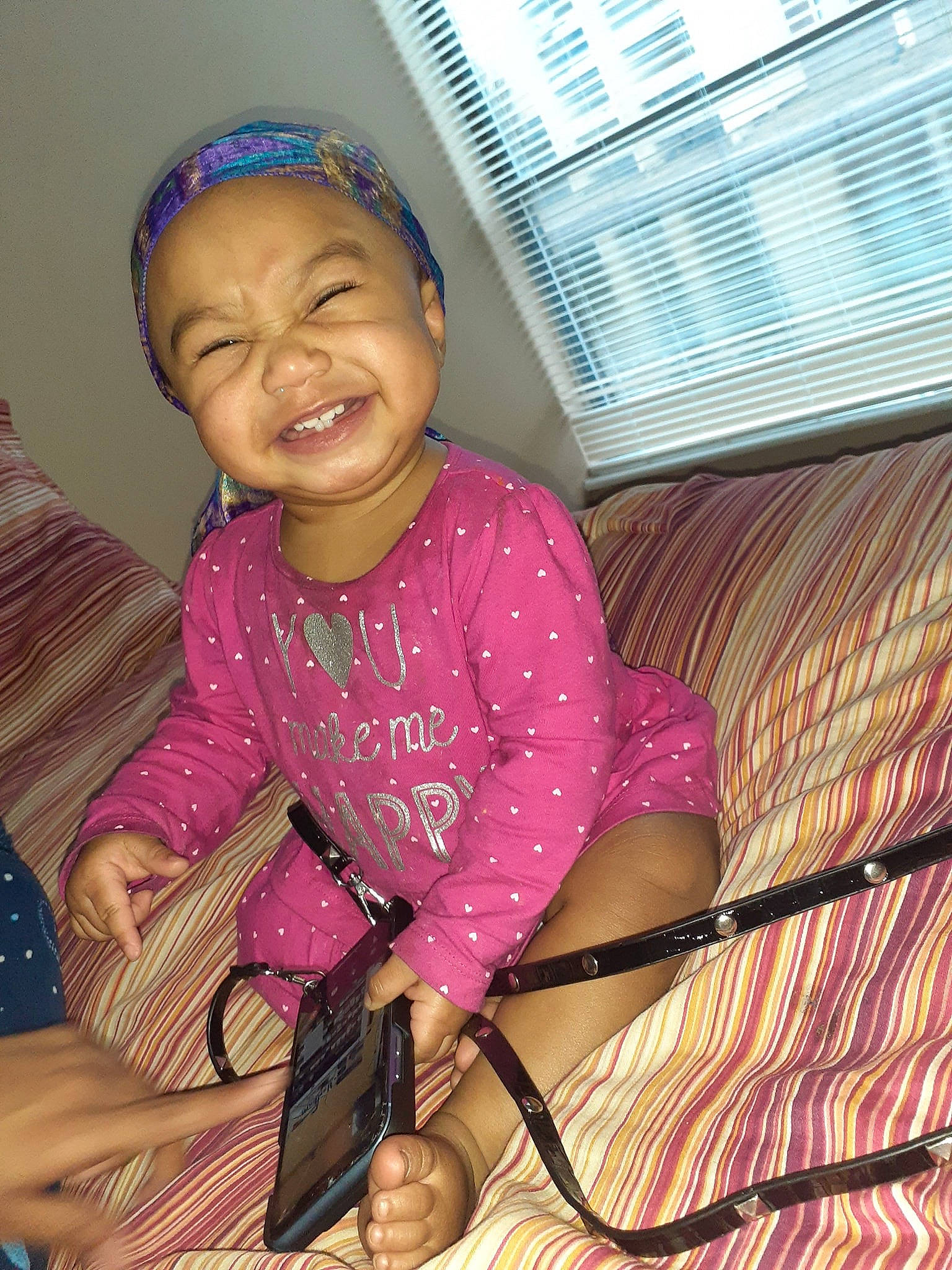 Maliaha joined the competition — help win amazing prizes! adaptation, child, face, facial_expression, fun, happy, joy, lady, person, pink, sitting, skin, smile, toddler, vacation