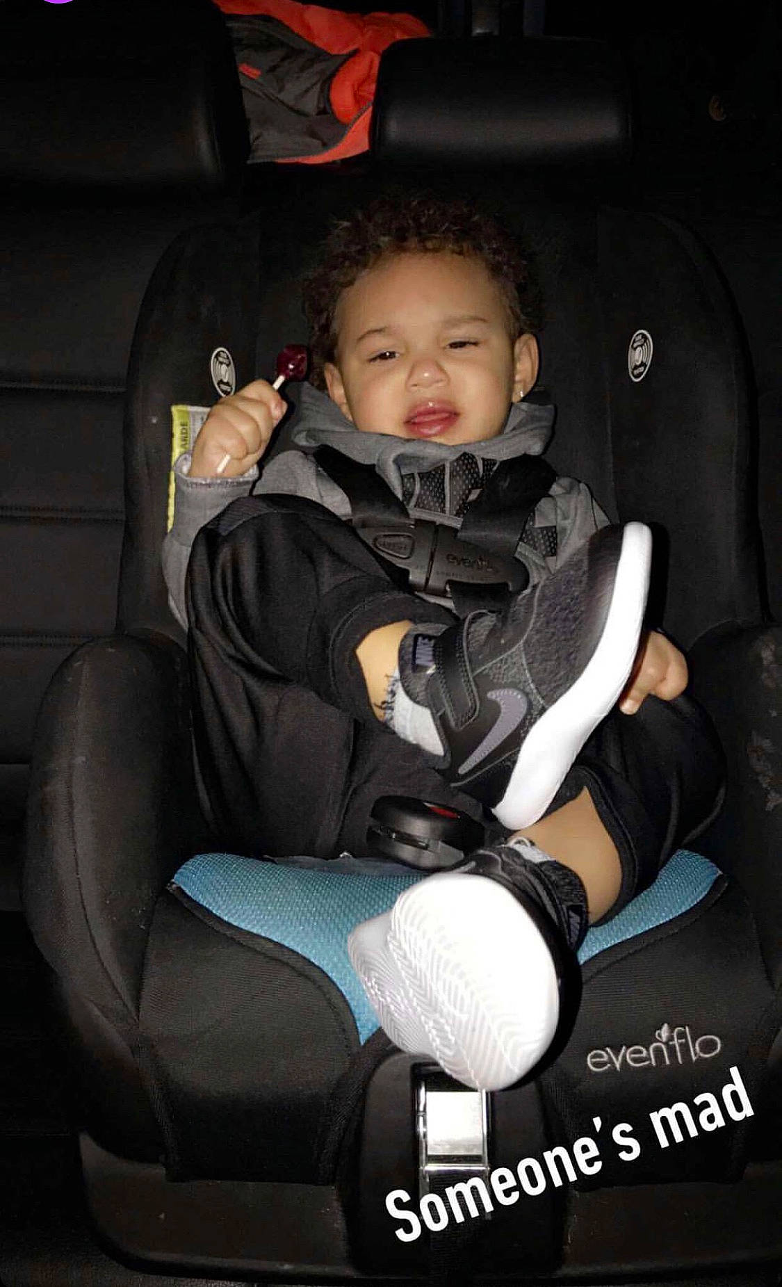 Jule is registered to the contest to win money with this photo: auto_part, baby, baby_carriage, baby_in_car_seat, baby_products, car_seat, child, person, product, sitting, toddler