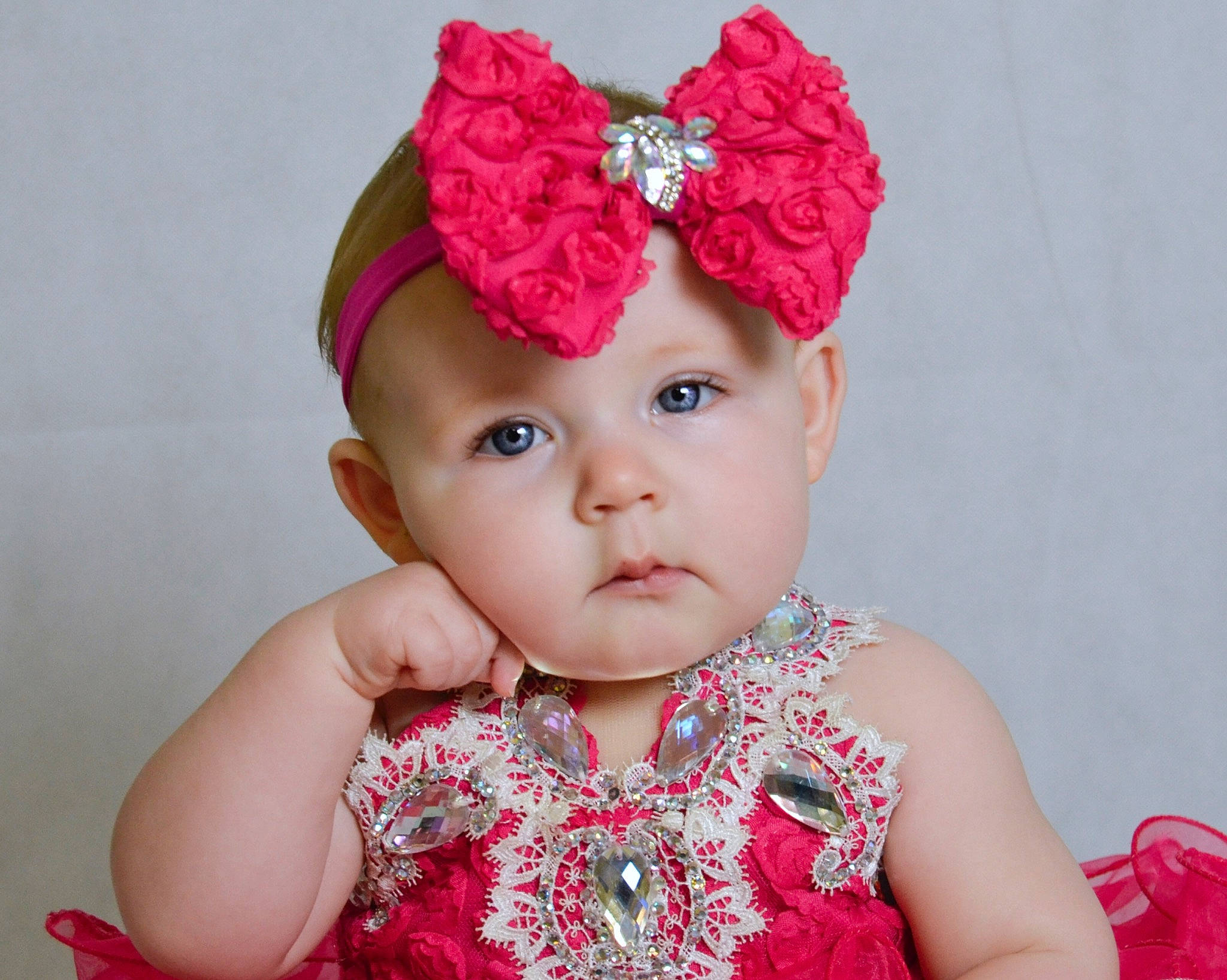 Abygail is registered to the contest to win money with this photo: baby, baby_toddler_clothing, cheek, child, child_model, clothing, costume_accessory, crochet, dress, fashion_accessory, hair_accessory, headband, headgear, headpiece, headwear, lip, pattern, person, pink, red