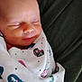 Jensen joined the competition — help win amazing prizes! newborn, baby, sleeping, smiling, blanket, patterned_blanket, wrapped, closeup, face, peaceful, infant, cute, soft, cozy, portrait, skin, head, resting, indoors, child
