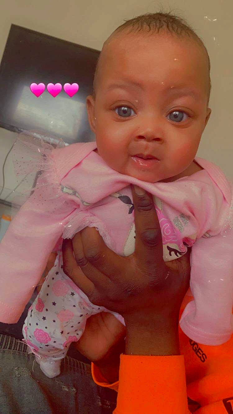 Ayunah is registered to the contest to win money with this photo: baby, baby_toddler_clothing, cheek, chest, chin, eye, finger, gesture, head, human, human_body, iris, lip, mouth, neck, nose, person, pink, skin, sleeve