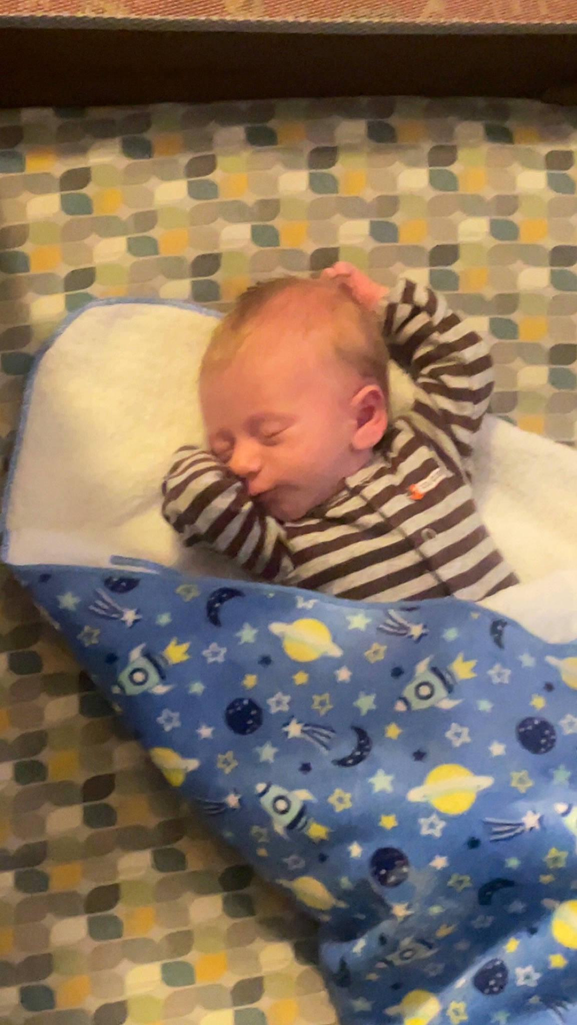 Collin is registered to the contest to win money with this photo: baby, baby_products, baby_safety, baby_toddler_clothing, bedtime, child, comfort, flooring, head, linens, pattern, person, product, room, toddler