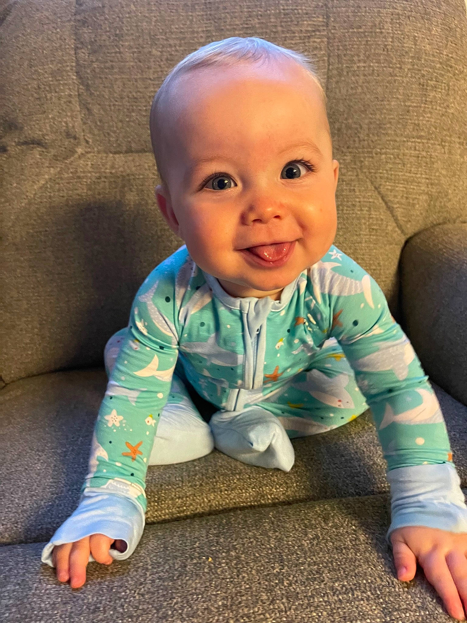 Sterling is registered to the contest to win money with this photo: baby, baby_crawling, baby_toddler_clothing, cheek, chin, comfort, crawling, eye, face, floor, flooring, happy, head, iris, joy, nose, person, skin, sleeve, smile