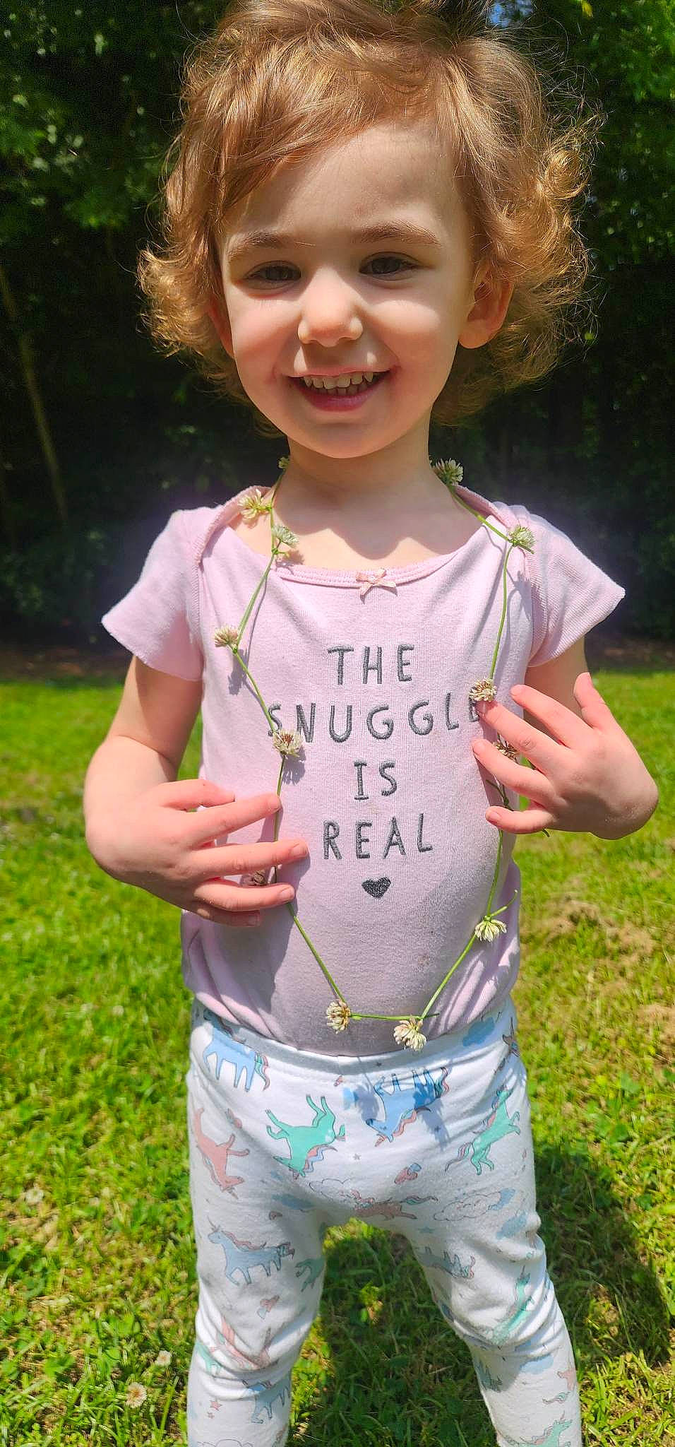 Aubree is registered to the contest to win money with this photo: child, cool, fun, gesture, grass, happy, joy, leisure, meadow, people_in_nature, person, pink, plant, recreation, running, sleeve, smile, spring, summer, t_shirt