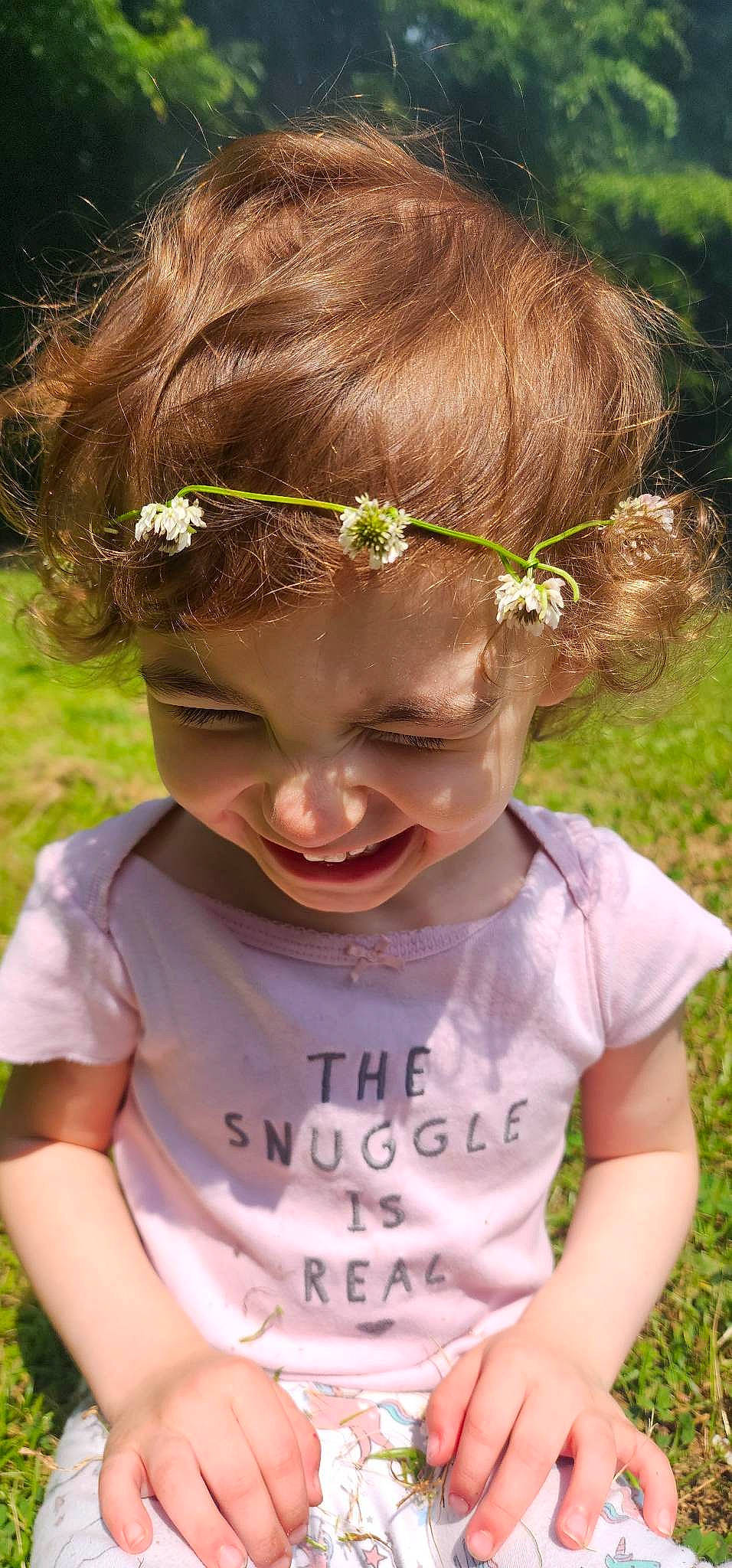 Aubree is registered to the contest to win money with this photo: baby, baby_toddler_clothing, child, eye, face, facial_expression, grass, happy, human, iris, nose, people, people_in_nature, person, pink, plant, skin, sleeve, smile, summer