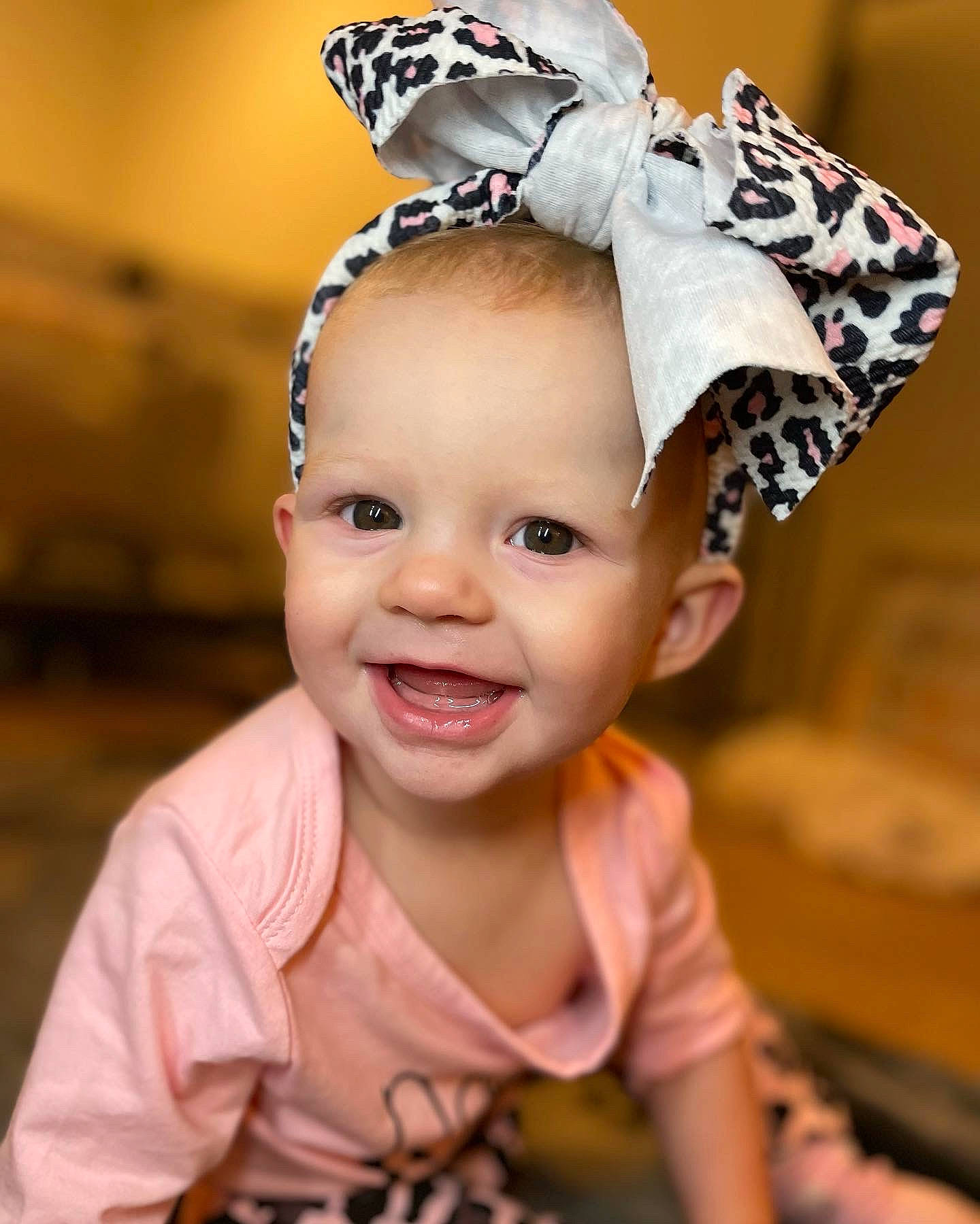 Norea is registered to the contest to win money with this photo: baby, baby_toddler_clothing, child, cool, costume_hat, eye, eyelash, face, fashion_accessory, flash_photography, happy, hat, head, headband, headgear, headpiece, iris, joy, person, pink