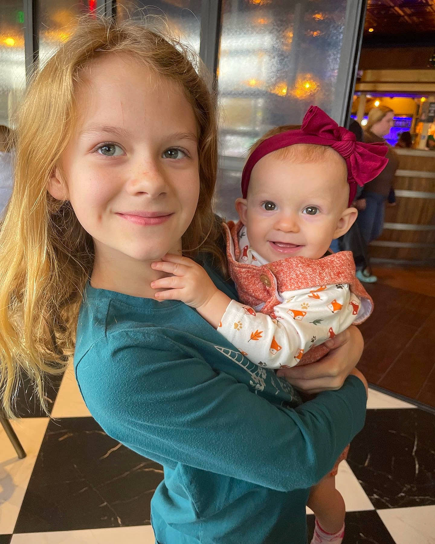 Norea joined the competition — help win amazing prizes! baby, baby_toddler_clothing, cheek, child, event, facial_expression, fun, hair, happy, head, interaction, iris, joy, lap, leisure, person, room, sitting, skin, smile