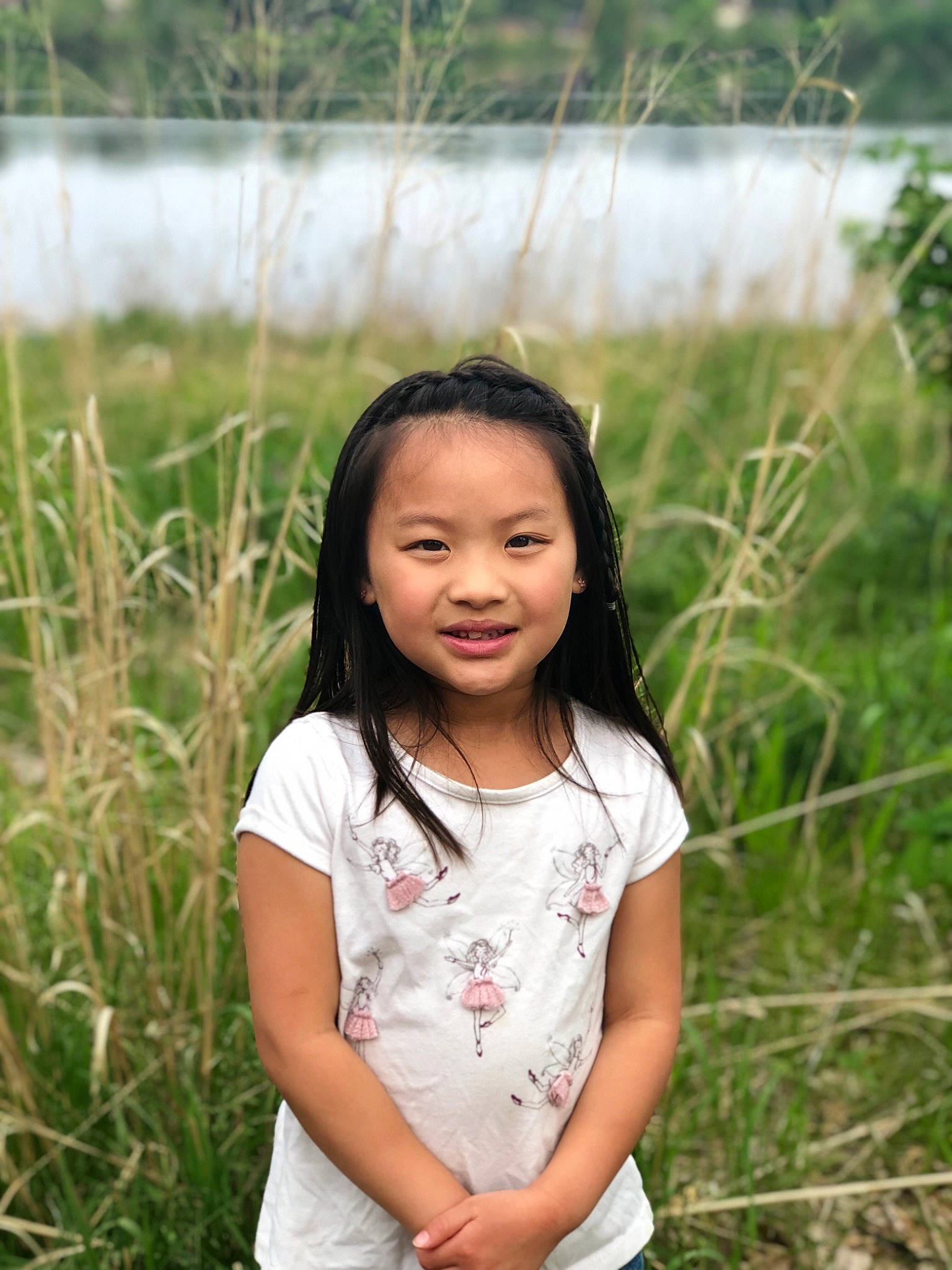 Novalie is registered to the contest to win money with this photo: adaptation, child, child_model, grass, grass_family, happy, joy, long_hair, people_in_nature, person, photography, plant, portrait, sitting, smile