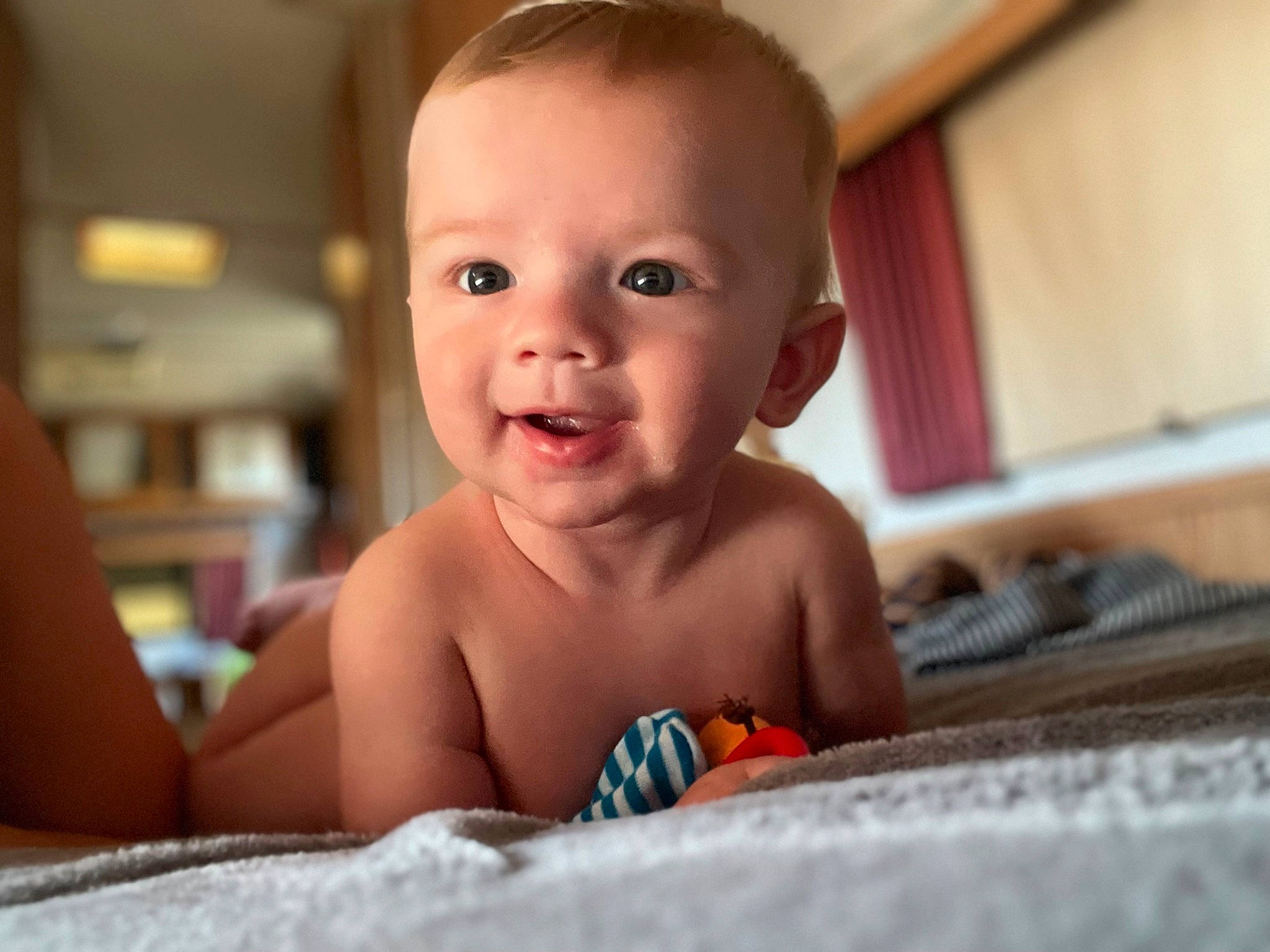 Gregory joined the competition — help win amazing prizes! baby, baby_products, cheek, chest, child, flash_photography, flooring, fun, happy, iris, mouth, nose, person, portrait_photography, room, sitting, skin, smile, toddler, tummy_time