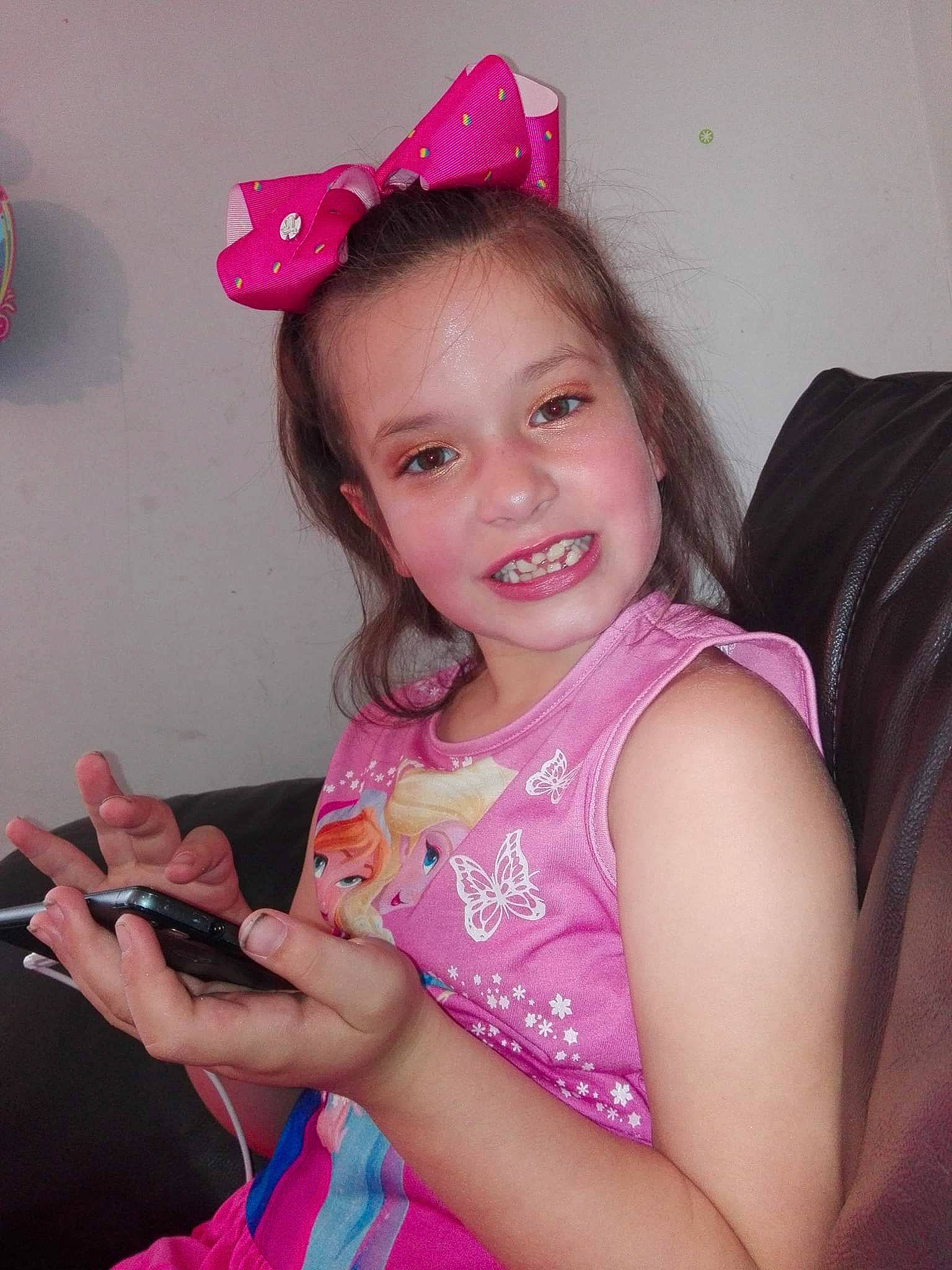 Lexi-mae is registered to the contest to win money with this photo: child, fashion_accessory, finger, hair_accessory, headband, joy, nail, person, pink, skin, smile, toddler