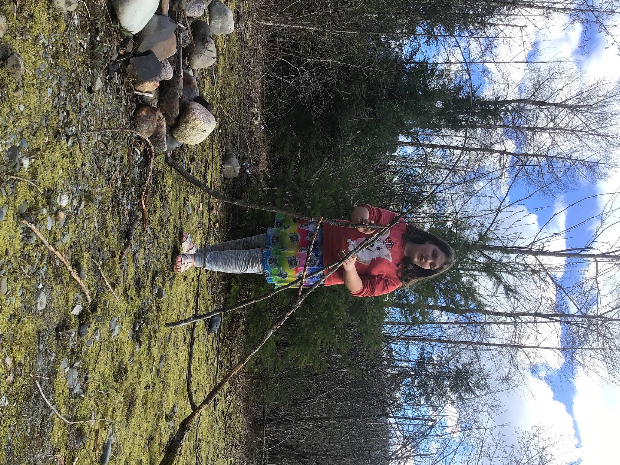 Keira is registered to the contest to win money with this photo: adventure, cloud, forest, northern_hardwood_forest, person, plant, pole, public_utility, recreation, reflection, sky, slope, soil, tree, trunk, twig, water, winter, wood