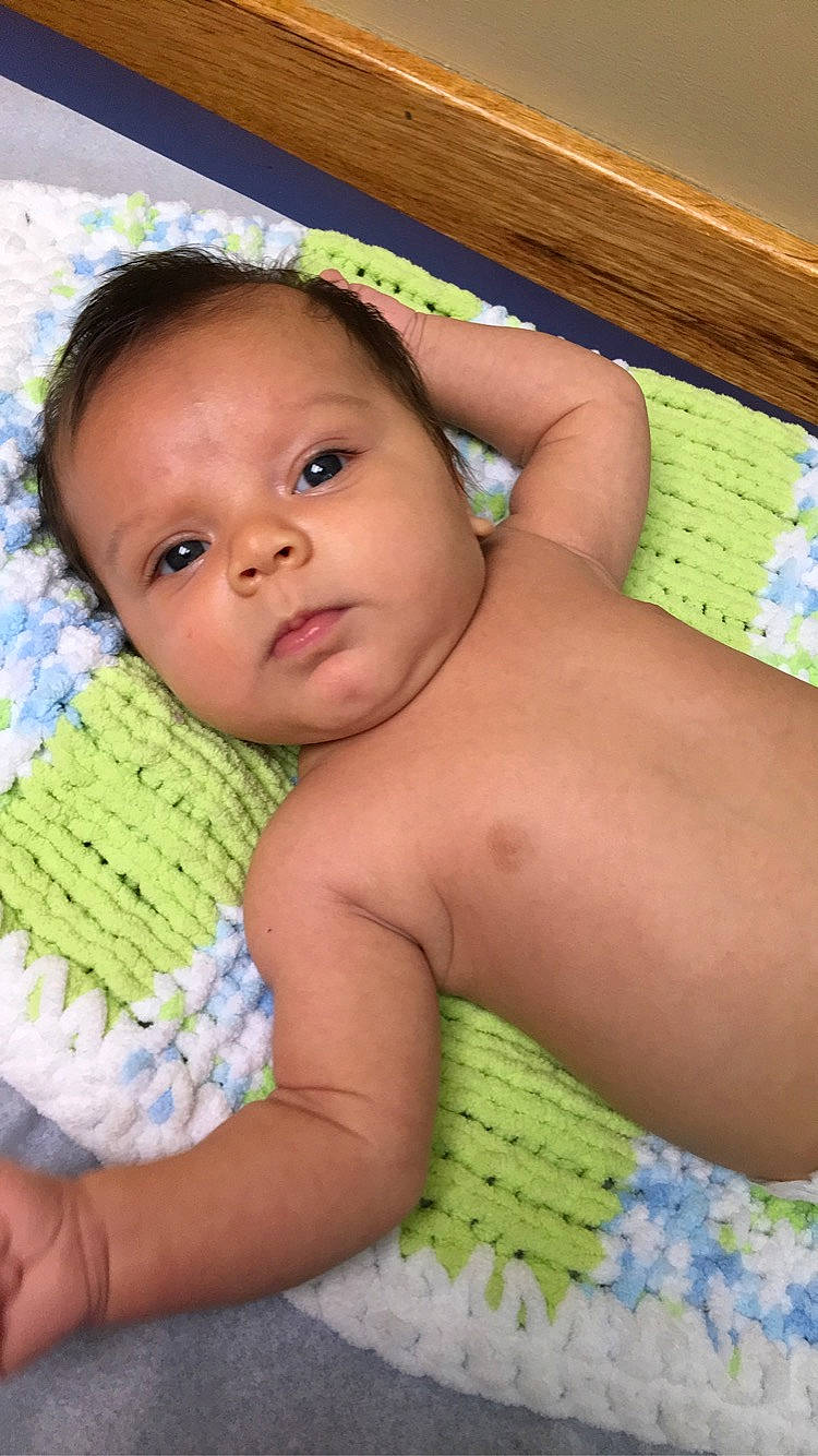 Jasiah is registered to the contest to win money with this photo: baby, child, muscle, neck, person, skin, toddler
