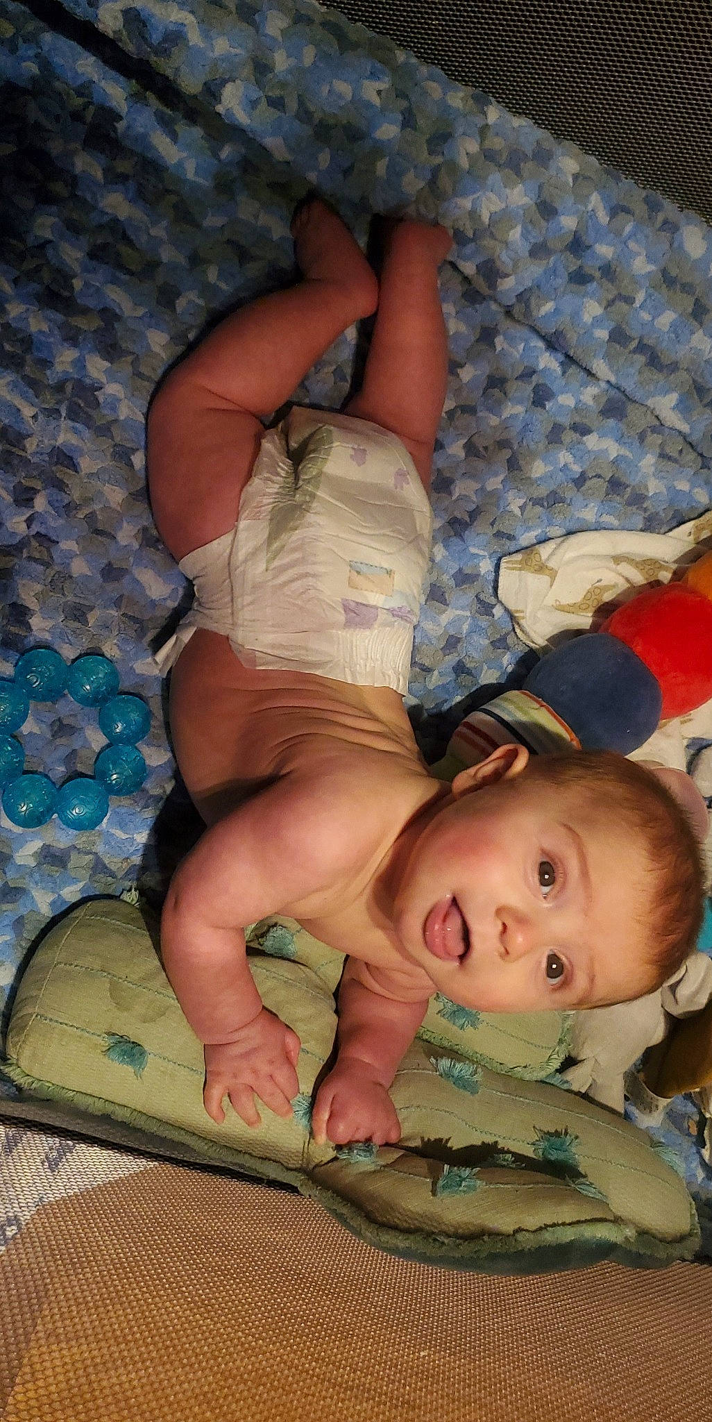 Carter is registered to the contest to win money with this photo: blue, cheek, chest, comfort, finger, fun, gesture, head, human_body, joint, leg, mammal, mouth, muscle, nose, person, skin, textile, thigh, trunk