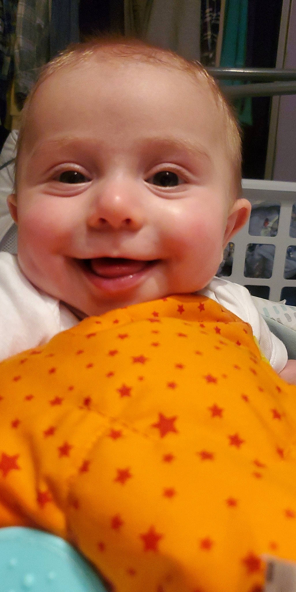 Carter joined the competition — help win amazing prizes! baby, baby_toddler_clothing, cheek, close_up, finger, happy, human_body, joy, lip, mouth, nose, orange, pattern, peach, person, pink, plant, product, skin, sleeve