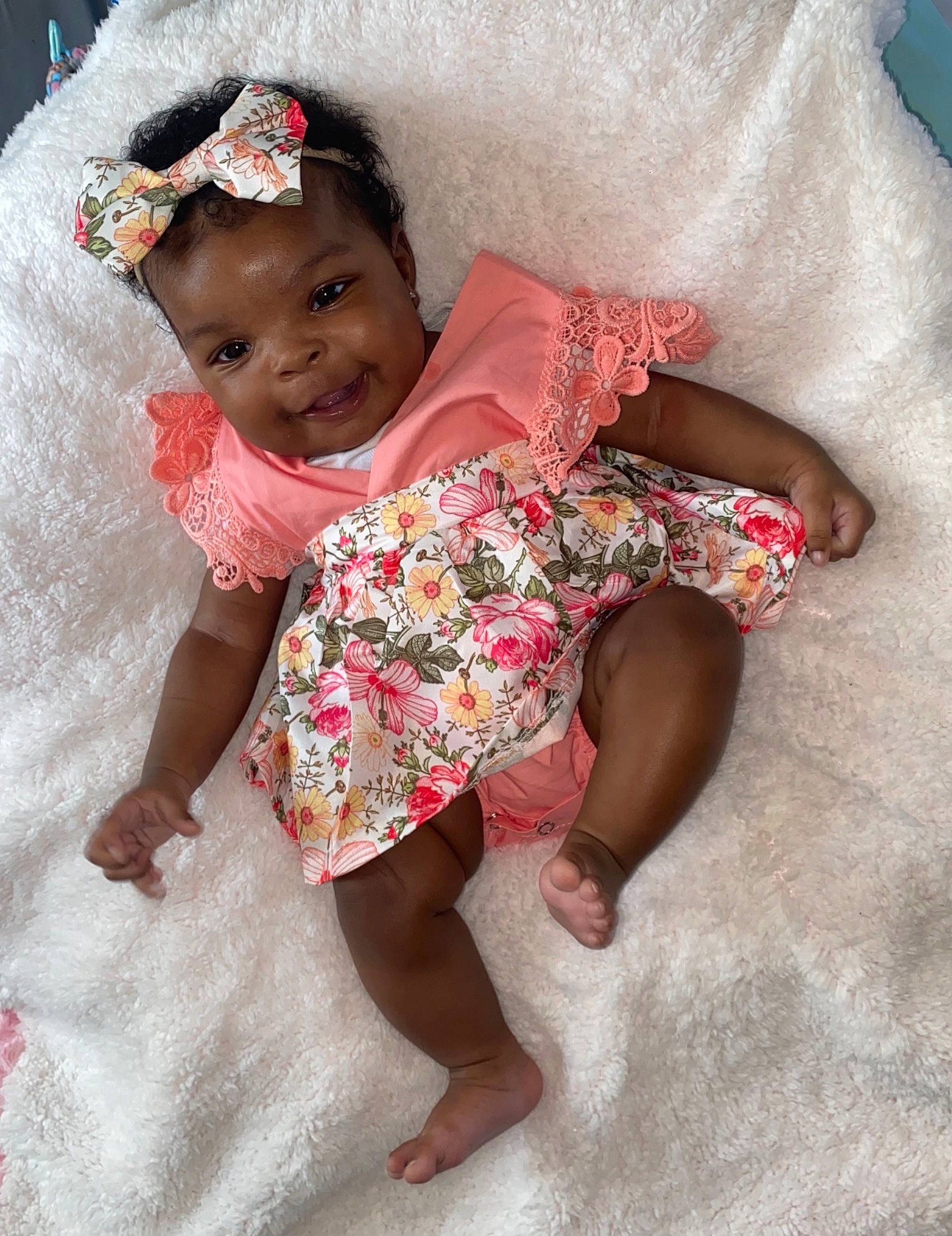 Milan is registered to the contest to win money with this photo: baby, baby_toddler_clothing, cheek, chin, comfort, dress, eye, hairstyle, happy, head, headgear, human_body, leg, person, pink, skin, sleeve, smile, textile, thigh